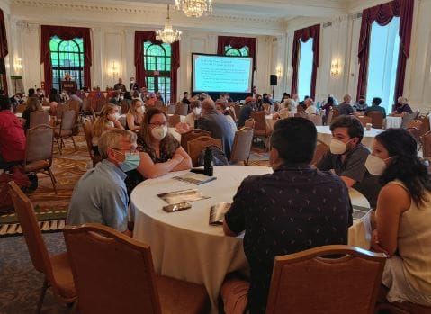 Braver Angels conference attendees discuss around dining room tables; Volunteer Spotlight; Tennessee; price on carbon