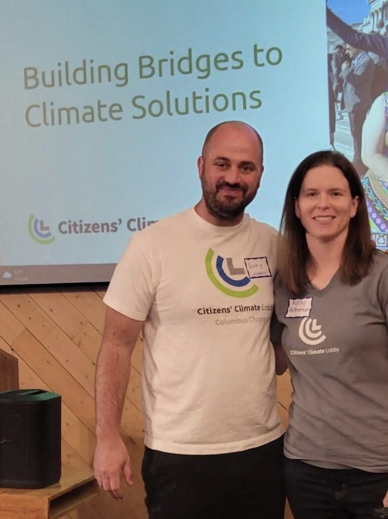 Two volunteers at a presentation