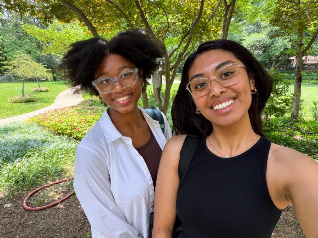 2 young pgm women outside