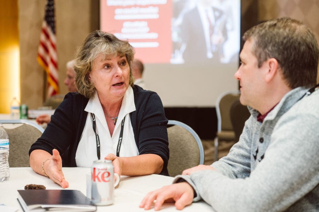 Woman and man talking at a CCL Conservative Conference