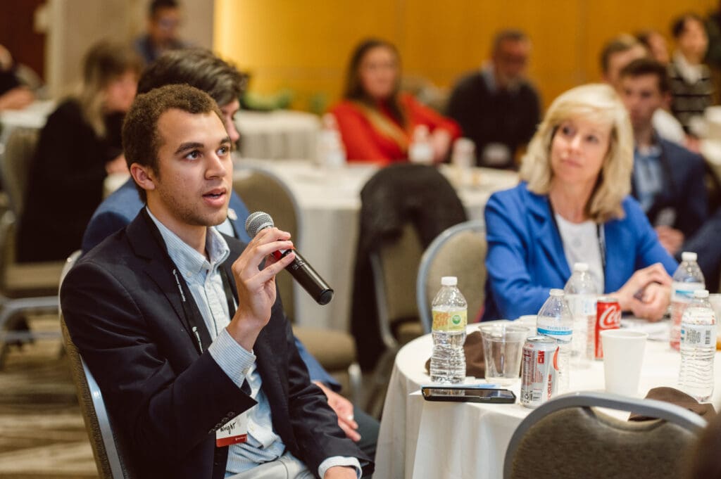 Man speaking as part of the audience at a CCL conservative conference